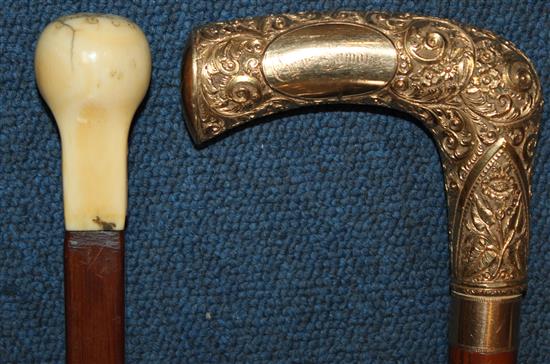 A 19th ivory handled square section walking cane & another